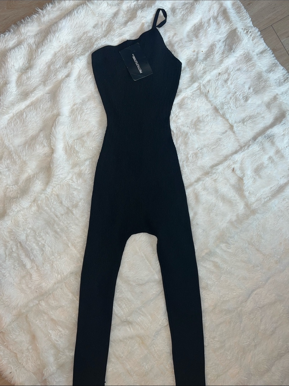 PrettyLittleThing Black Ribbed One-Shoulder Jumpsuit